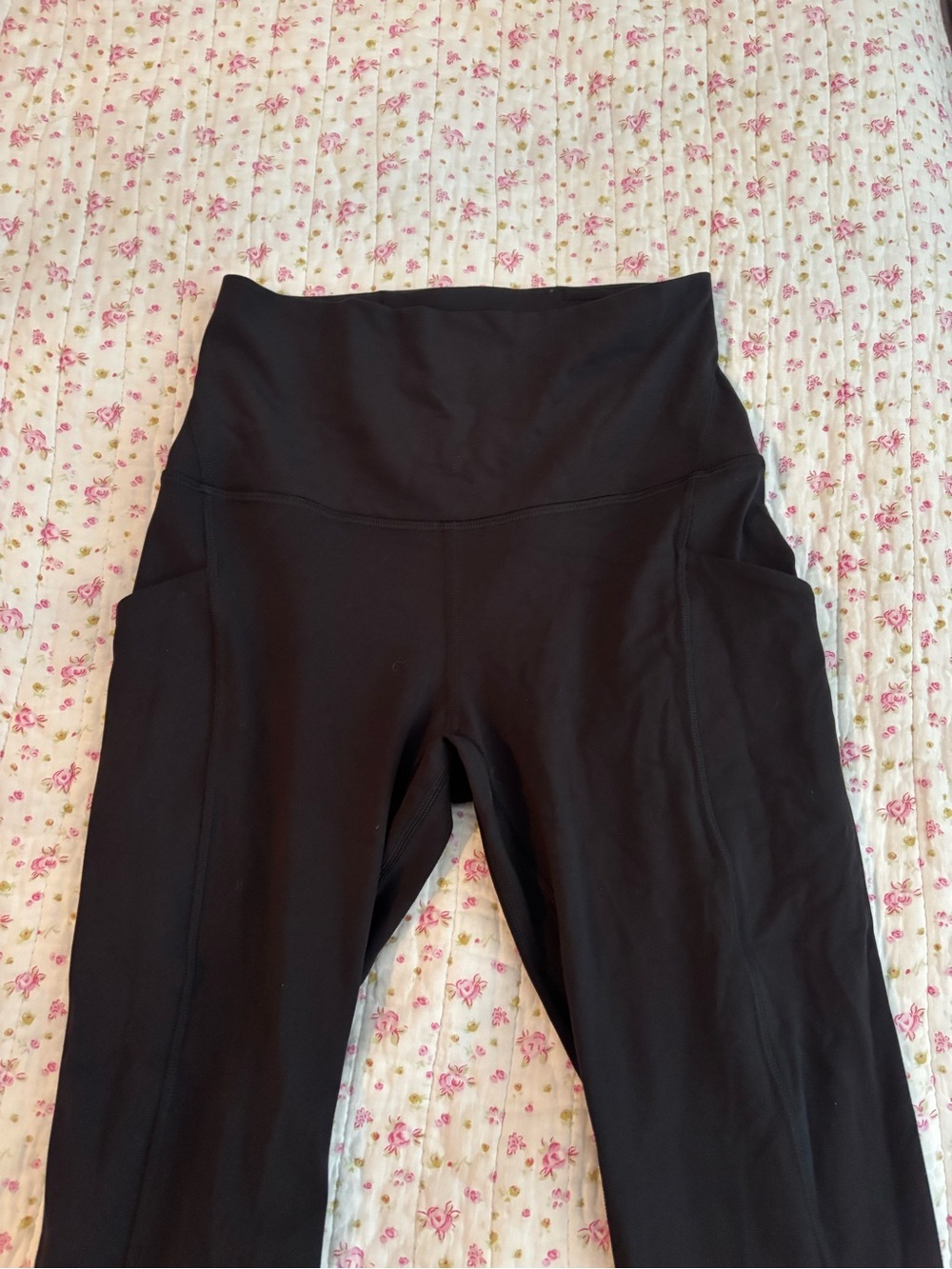 2 pairs of lululemon athletica Black High-Rise Leggings with Side Pockets